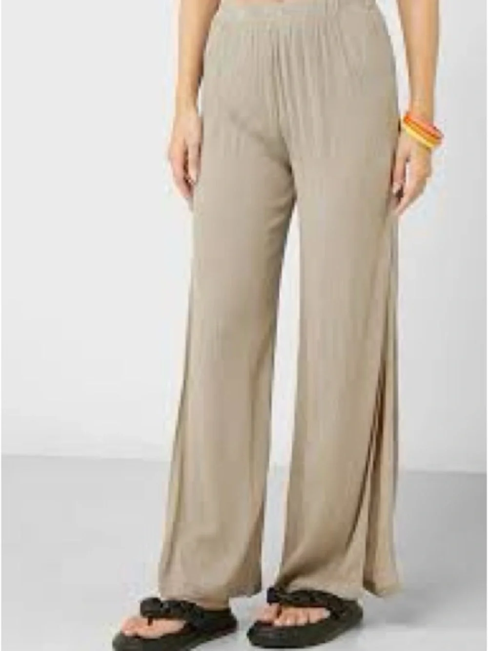 Nasty Gal Textured Wide-Leg Pants in Light Beige. Leg open to knee